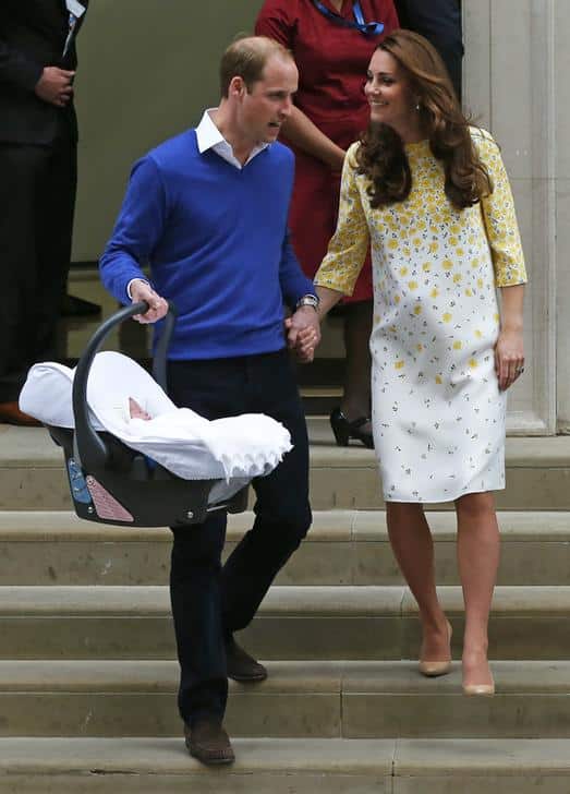 Britain’s Prince William and his wife Catherine, Duchess of Cambridge leave with their baby daughter from the Lindo Wing of St Mary’s Hospital in London