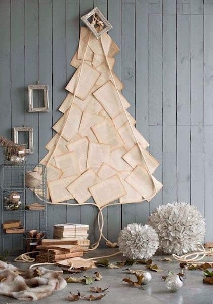 albero con carta libri muro