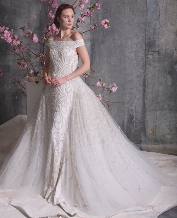 abito sposa aderente con gonna sovrapposta