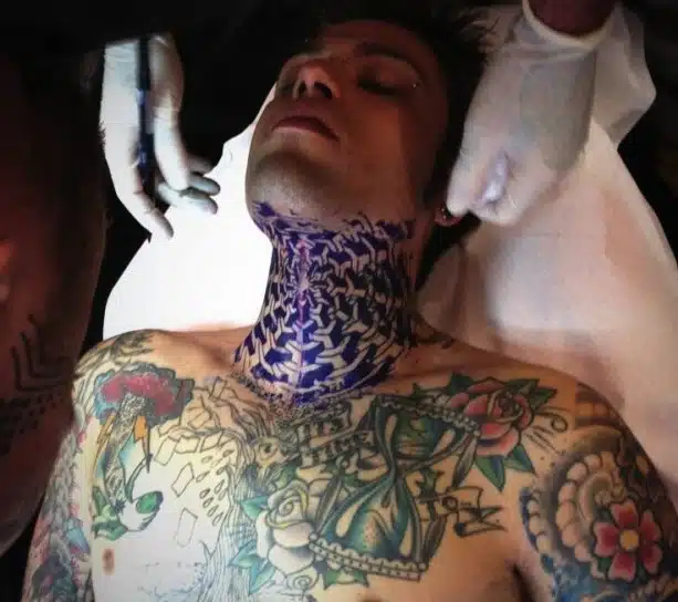 fedez tatuaggio ragnatela