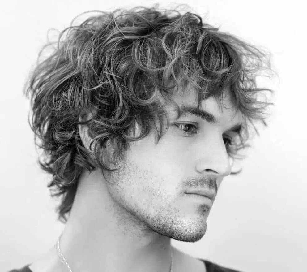 taglio capelli lunghi uomo mossi